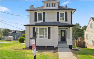 Exterior of nicely renovated property with attic space