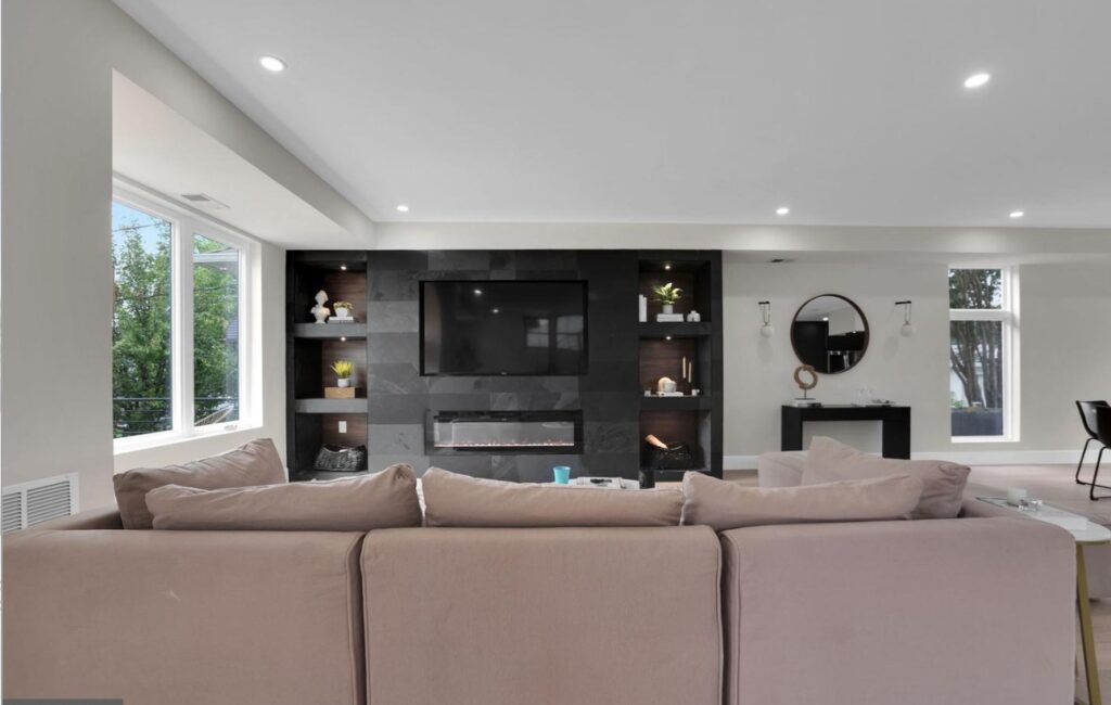 The TV room view with the couch on the foreground.