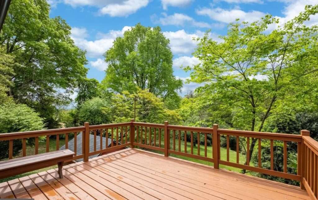 Expansive deck was added to enjoy the greenery