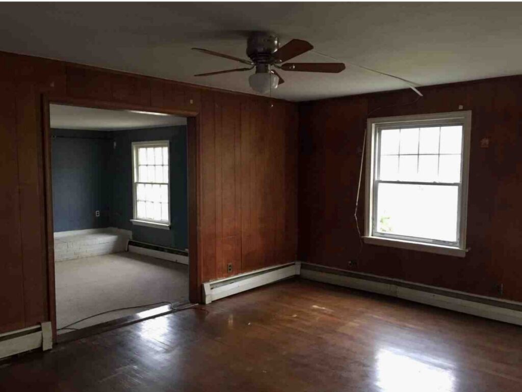 The before-renovation interior with dark walls