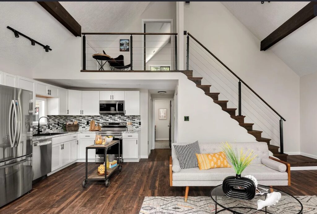 The interior picture with the kitchen and stairs