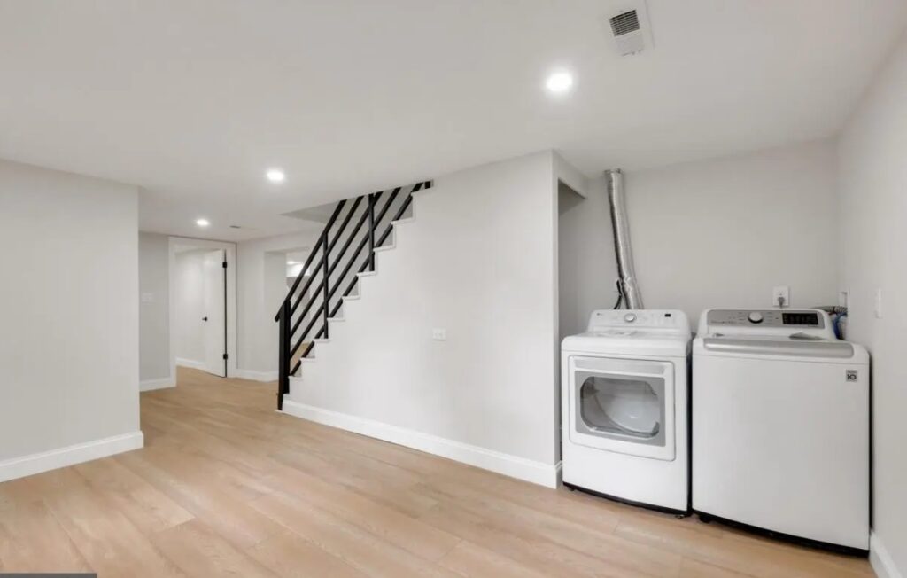 Newly finished white and briight basement