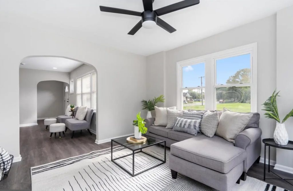 The newly renovated living room with an arch